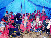 porters in adequate shelter and good gear