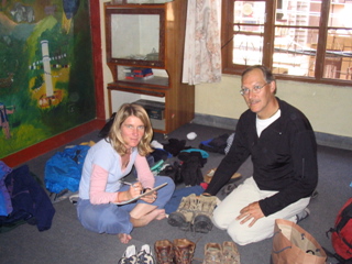 Wanda (Canada's rep) and Neil sorting out donated boots in Kathmandu