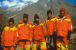 Peregrine porters in bright red jackets, Rod Griffith, Australia
